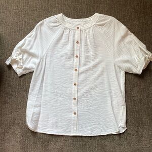 Women’s NWT, a loves a, soft white shirt. Size XS. Cute ties on sleeves.